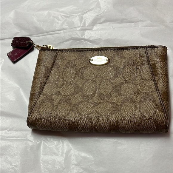 Coach Brown Clutch with Monogram Pattern and Zipper Closure - Picture 1 of 13